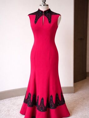 Elegant Red Sleeveless Evening Gown with Black Beaded Accents